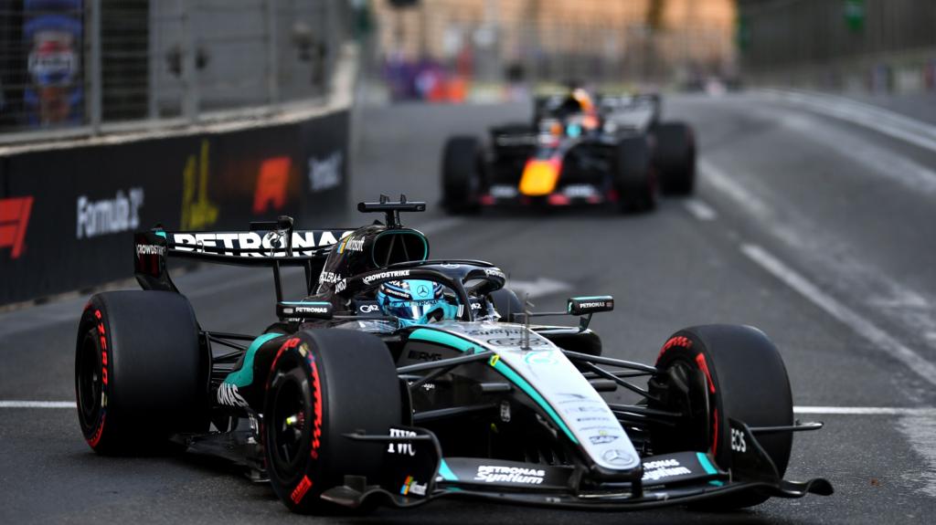 Russell wins despite late Verstappen challenge