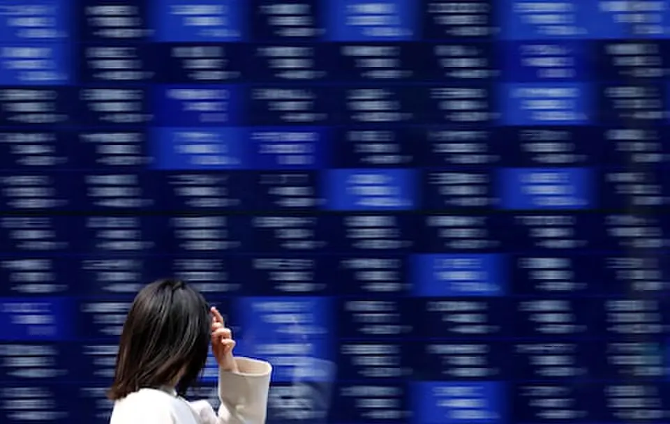 Asian shares fall as Alphabet earnings miss drags Wall St futures lower