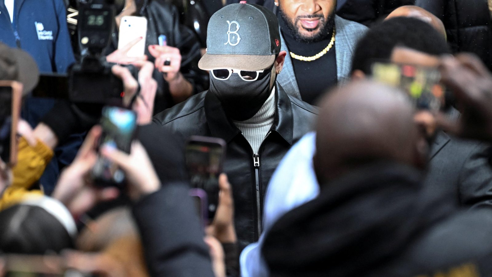 Chris Brown given suspended sentence over bottle attack at London club