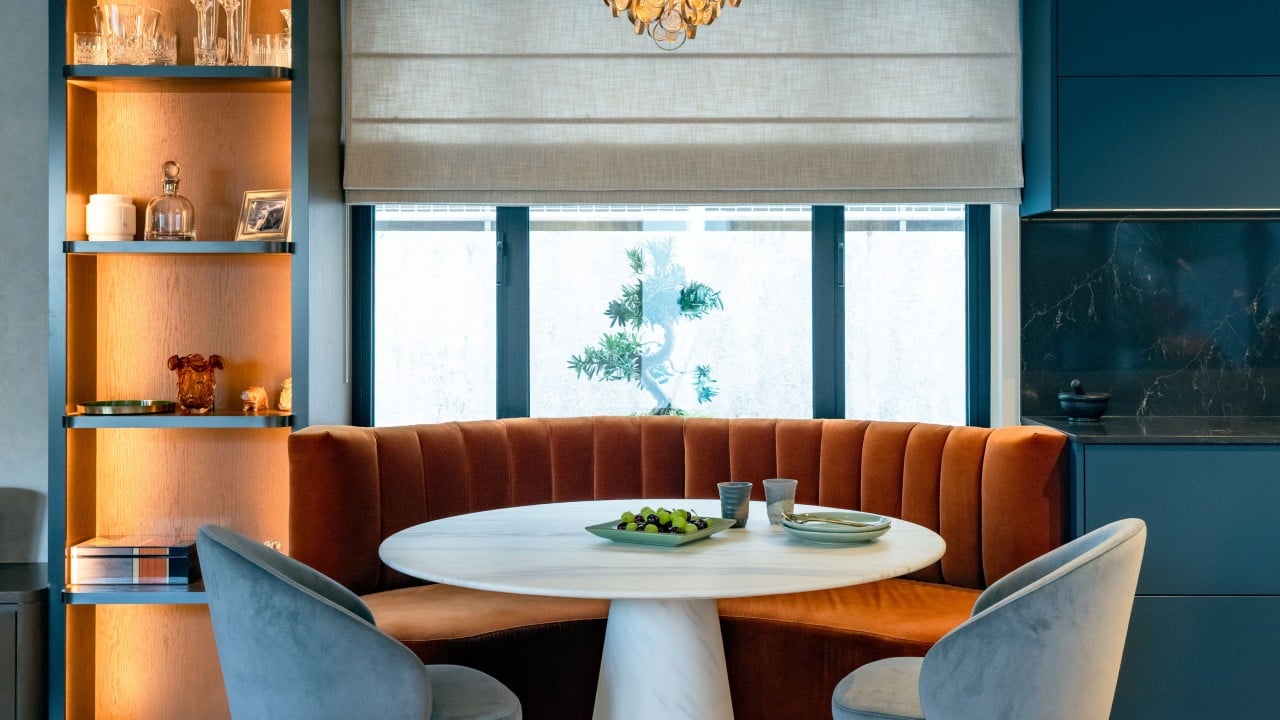 Hong Kong flat reimagined with open layout and natural light for couple and their two dogs