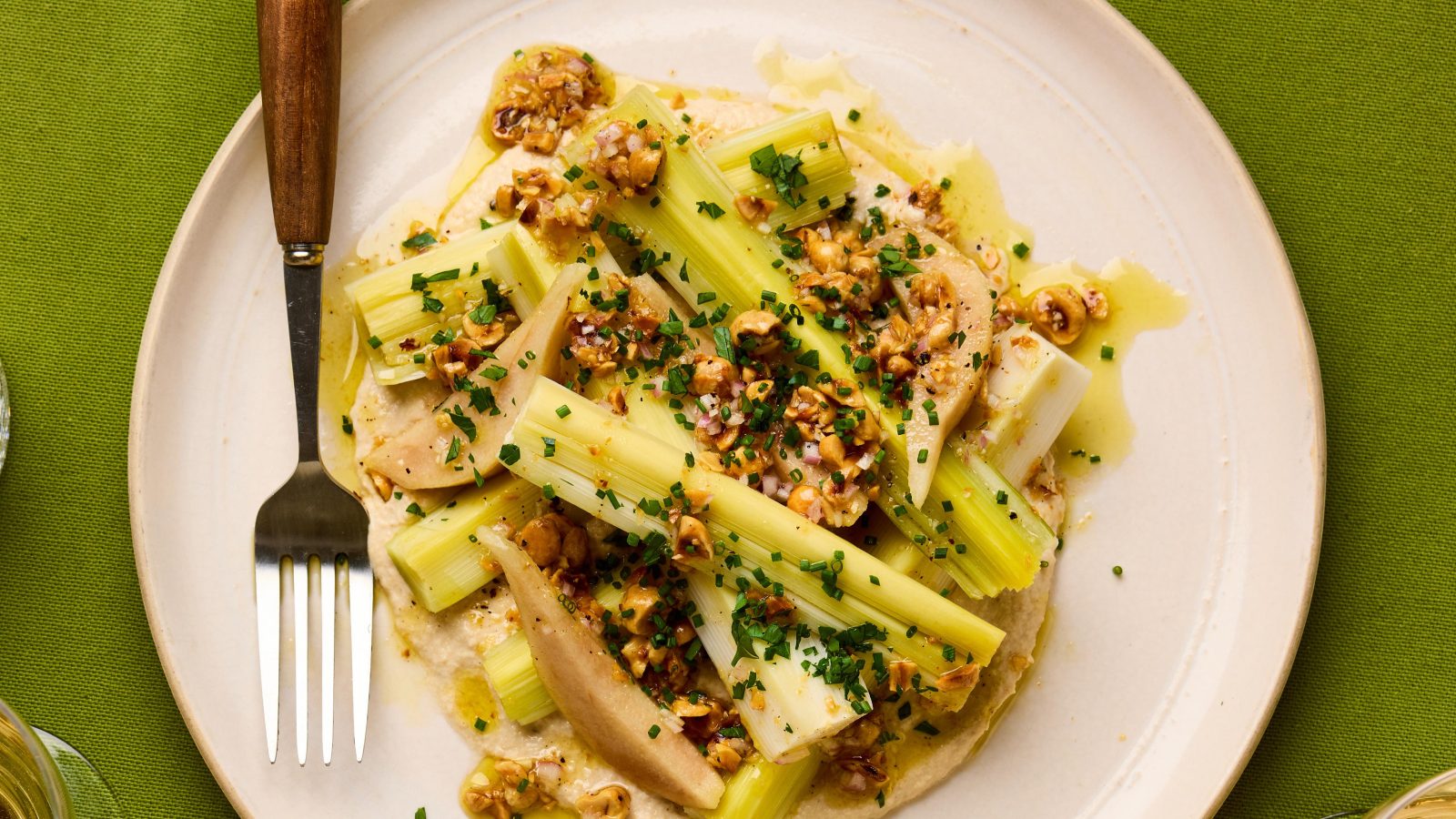 Jackson Boxer’s vegan recipe for poached leeks with pickled pear and hazelnuts