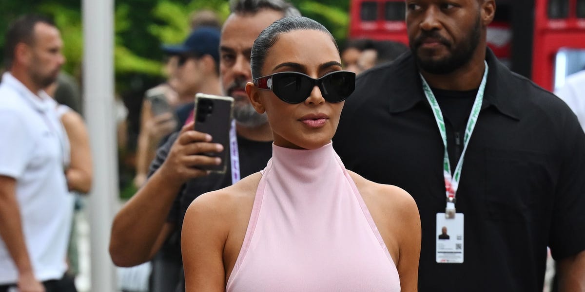 Kim Kardashian Matches Her Bubblegum-Pink Hermès Kelly to Her Alaïa to Support Lewis Hamilton in Singapore
