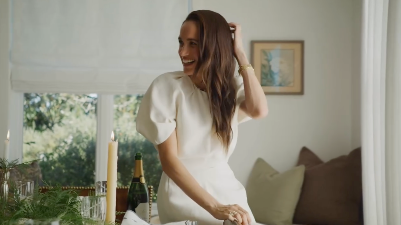 Meghan Markle’s 2 Holiday Looks Include an Ivory Party Dress and Fall’s It Color