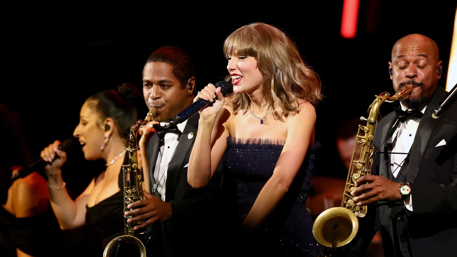 Taylor Swift Fires Up Academy Gala With Four Songs in Her First Band Performance Since the Eras Tour