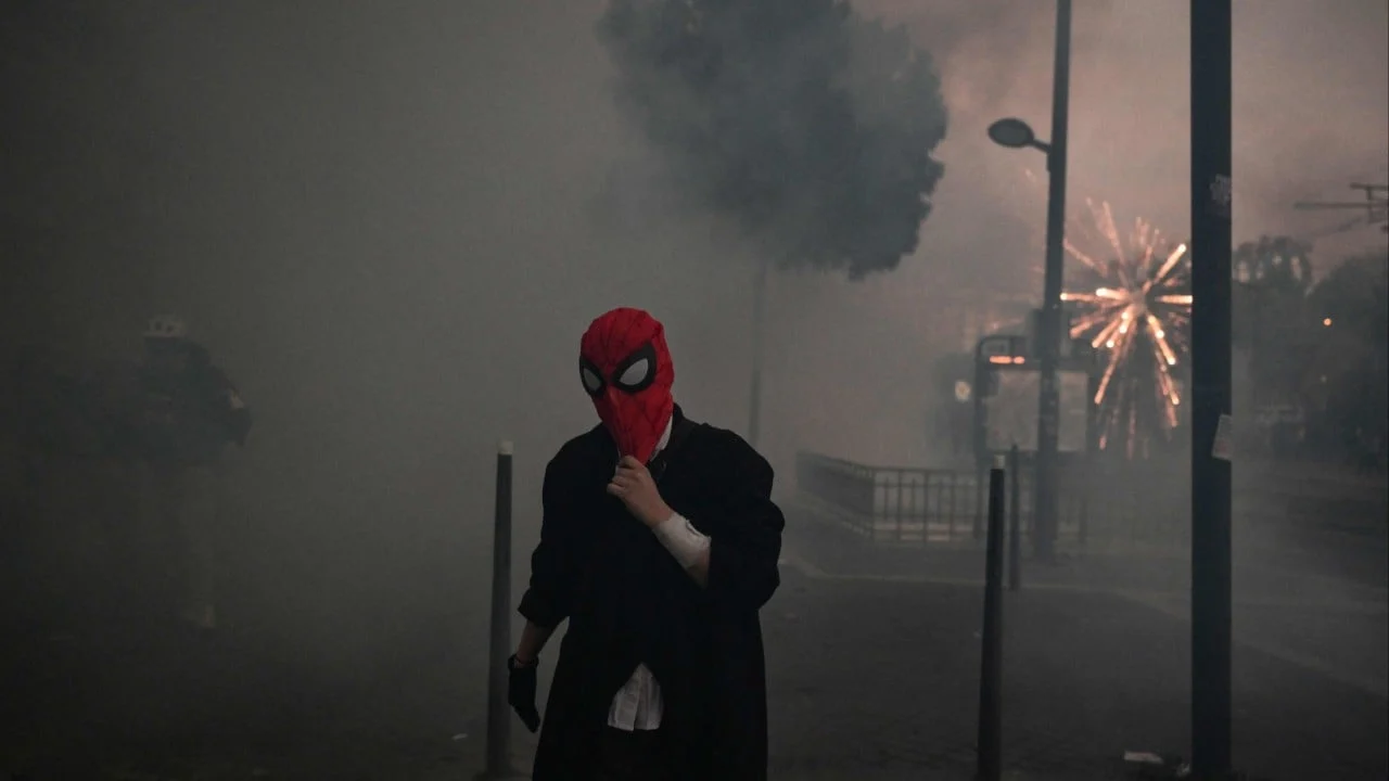 Clashes break out at France’s Halloween protests, as hundreds of thousands take to streets